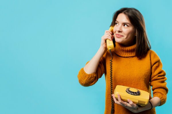 a girl calling on a telephone