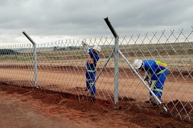 Razor wire mesh fencing installation