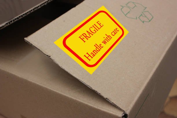 Cardboard box for moving  Label Fragile Handle with care  Recycling symbol