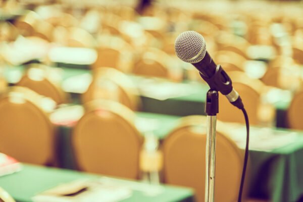 Microphone in a room for a public speaking event